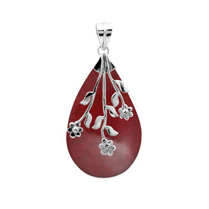 Handcrafted 925 Sterling Silver Red Coral teardrop pendant with floral branch overlay, mirror-polished finish, and detailed Balinese artistry for wholesale jewelry buyers.