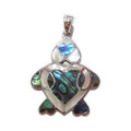 Sterling silver turtle pendant with heart shell inlay and polished finish