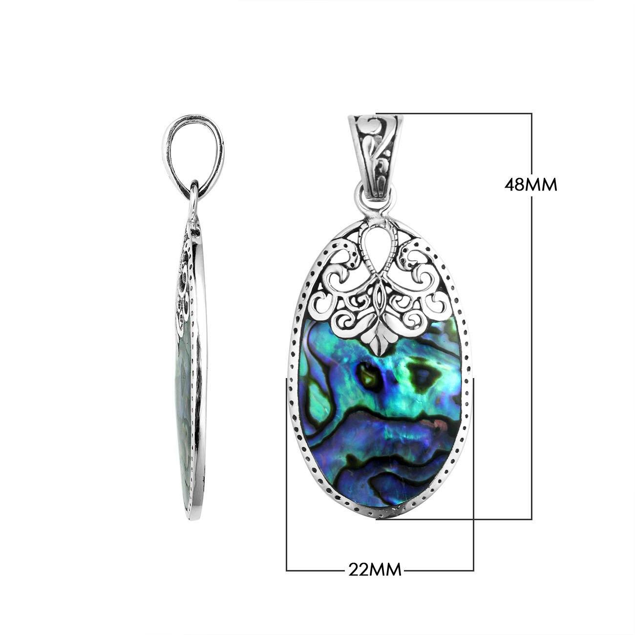 Wholesale sterling silver oval pendant with genuine abalone shell inlay and ornate Balinese filigree design, handcrafted in Bali.