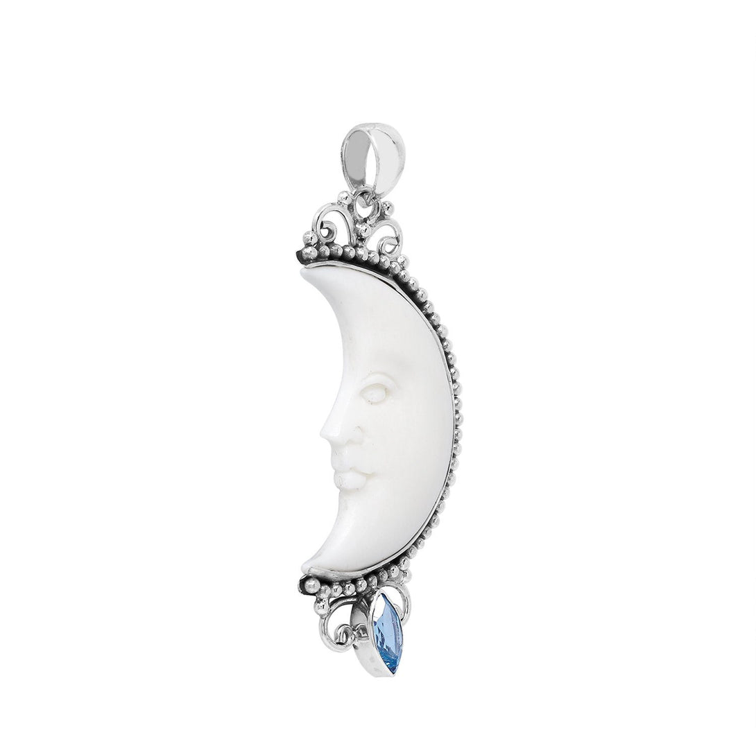 AP-1185-BT Sterling Silver Half Moon Shape Pendant With Bone Face and Blue Topaz Jewelry Bali Designs Inc 