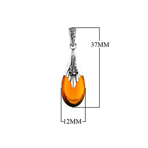 Sterling silver Bali pendant with Amber Quartz teardrop, handcrafted artisan jewelry.
