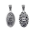 Sterling silver oval pendant with intricate Bali carvings, wholesale artisan jewelry.