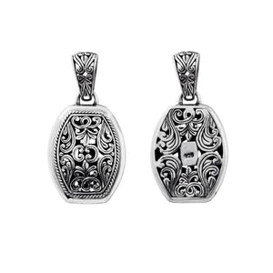Sterling silver barrel-shaped pendant with Balinese scrollwork, wholesale artisan jewelry.