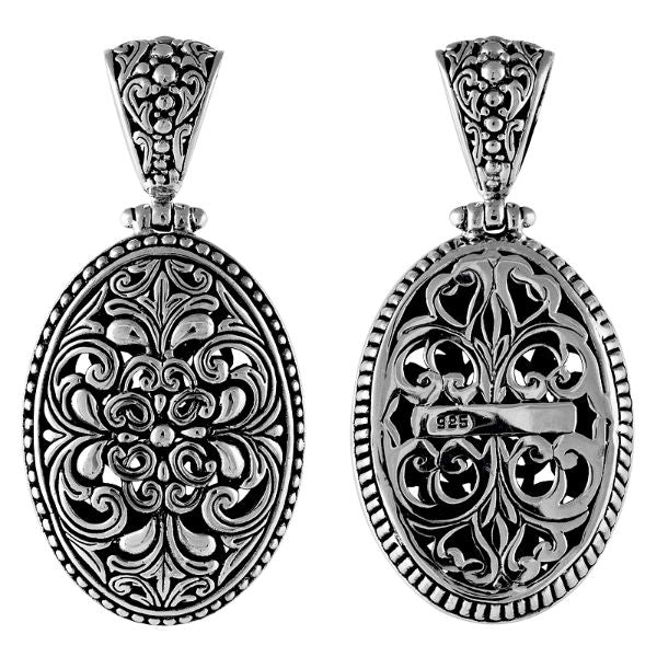 Sterling silver oval pendant with floral scrollwork, handcrafted Bali wholesale jewelry.
