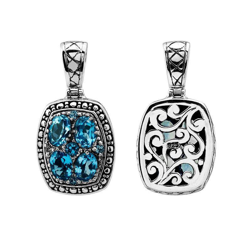 Sterling silver rectangular pendant with cluster of faceted Blue Topaz Quartz gemstones and Balinese swirl carvings, wholesale jewelry.