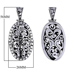 Sterling silver oval pendant with openwork Balinese swirl filigree and dotted edge, wholesale Bali jewelry.