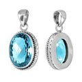 Sterling silver oval pendant with Blue Topaz Quartz, handcrafted in Bali for wholesale jewelry collections.