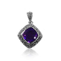 Sterling silver pendant with cushion-cut Amethyst Quartz and Balinese carvings, handcrafted in Bali.