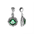 Sterling silver pendant with cushion-cut green quartz, handcrafted in Bali with ornate scrollwork and oxidized finish.
