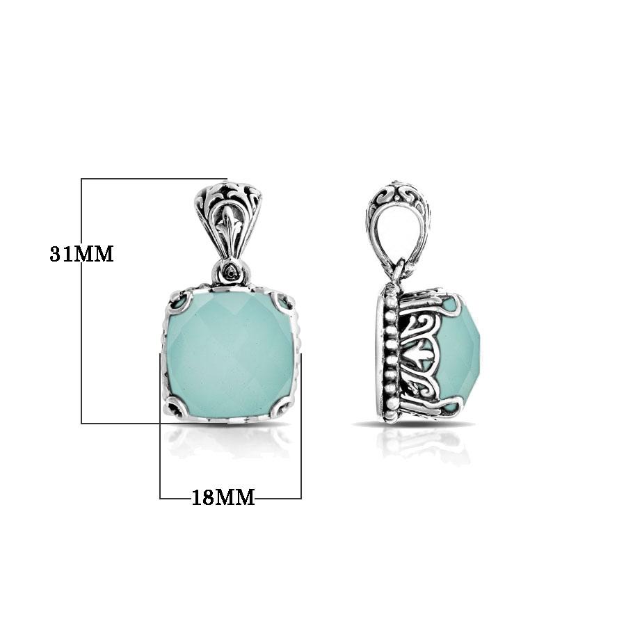Sterling silver pendant with cushion-cut green chalcedony quartz, handcrafted in Bali with ornate detailing and oxidized finish.