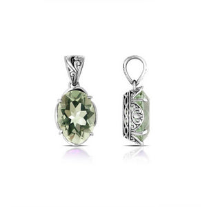 Sterling silver pendant with oval-cut green amethyst quartz, handcrafted in Bali with scroll detailing and oxidized finish.