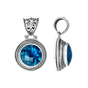 Wholesale sterling silver pendant with round Blue Topaz Quartz and ornate Balinese bail.