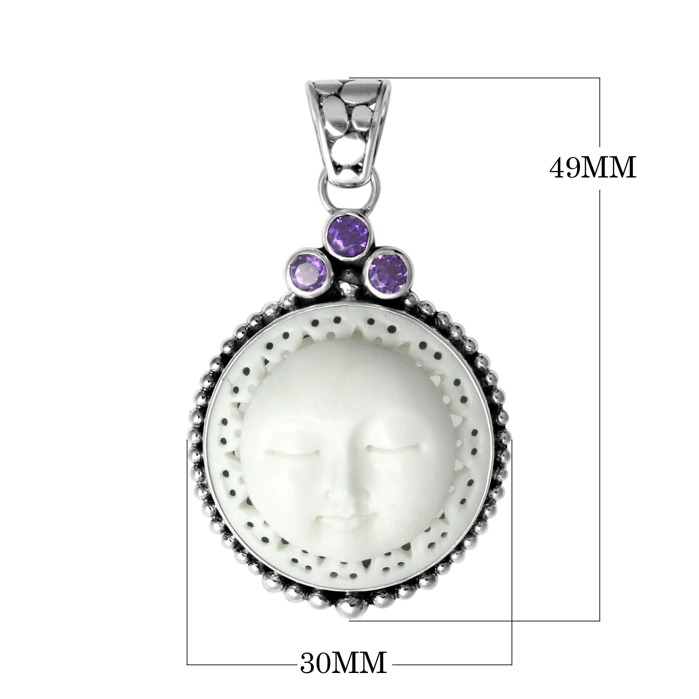 Wholesale sterling silver pendant with carved bone moon face and Amethyst Quartz accents, handcrafted in Bali.