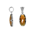 Sterling Silver oval-shaped Citrine Quartz pendant with floral engraved detailing