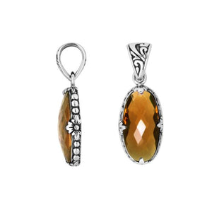 Sterling Silver oval-shaped Citrine Quartz pendant with floral engraved detailing