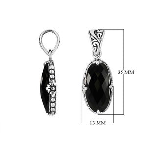 Sterling silver oval pendant with polished Black Onyx stone and antique Bali floral detailing