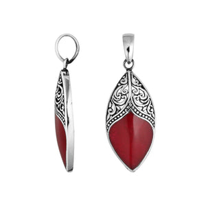 Handcrafted Red Coral Marquise Pendant With Detailed Silver Overlay Design