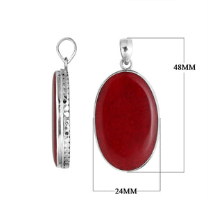 925 sterling silver oval pendant with red coral and hammered silver edge handcrafted in Bali