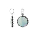 Round sterling silver pendant with mother of pearl and Balinese pattern handcrafted in Bali.