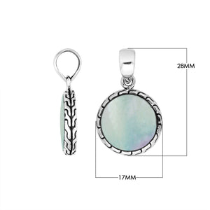 Round sterling silver pendant with mother of pearl and Balinese pattern handcrafted in Bali.