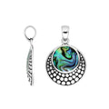 Round sterling silver pendant with abalone shell and dotted Balinese pattern handcrafted in Bali.