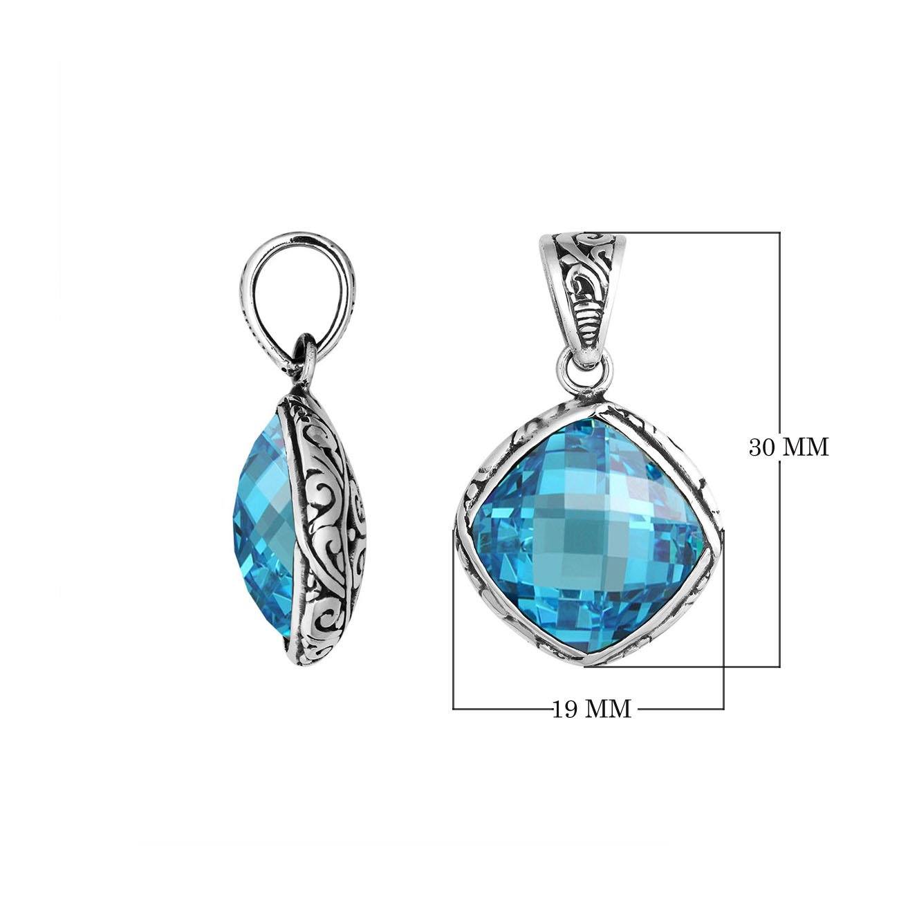 Sterling silver cushion pendant with blue topaz quartz and Balinese scroll pattern handcrafted in Bali.
