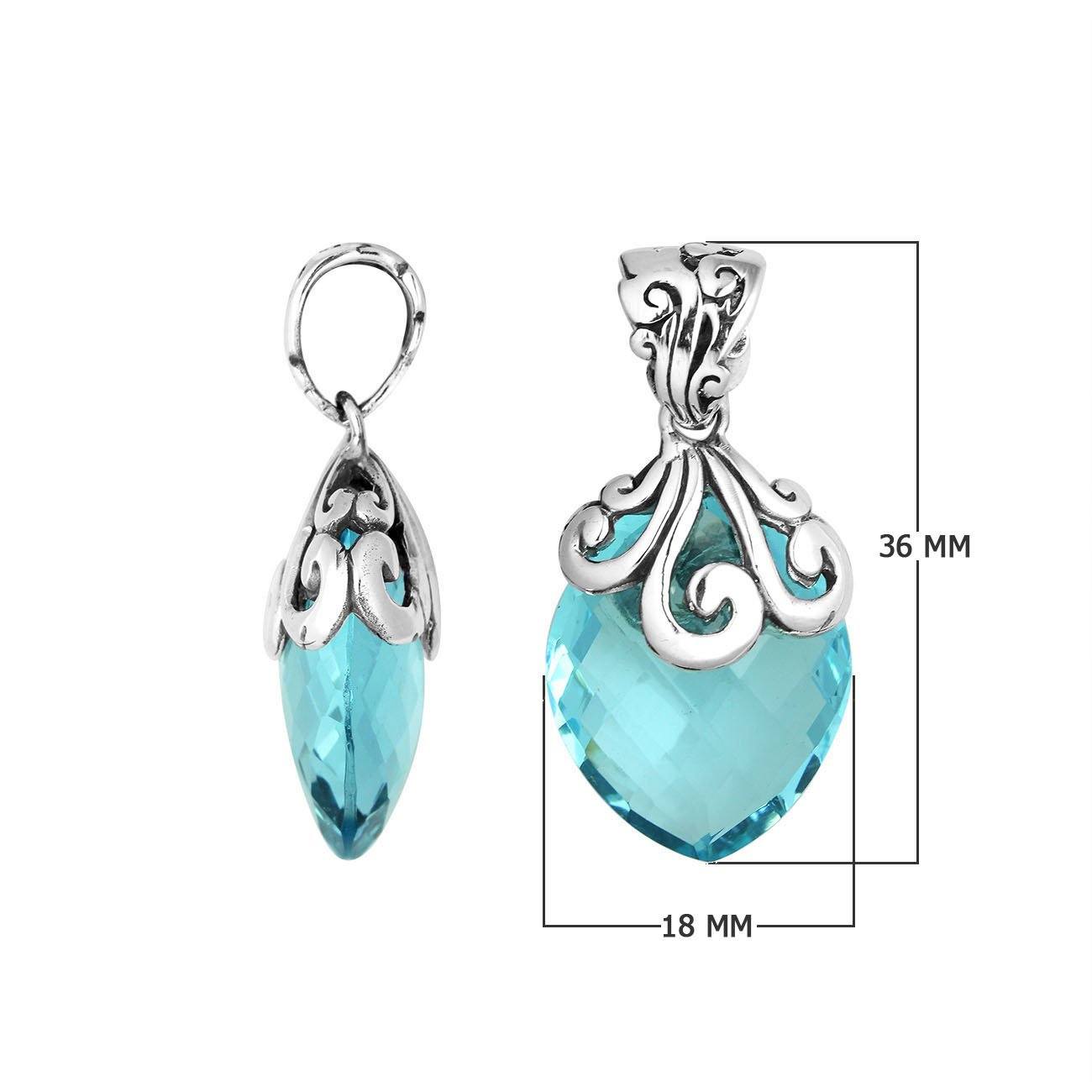 Handcrafted 925 Sterling Silver Blue Topaz Quartz pendant with intricate swirl filigree pattern, mirror-polished surface, and Balinese-inspired marquise shape design for wholesale jewelry suppliers.