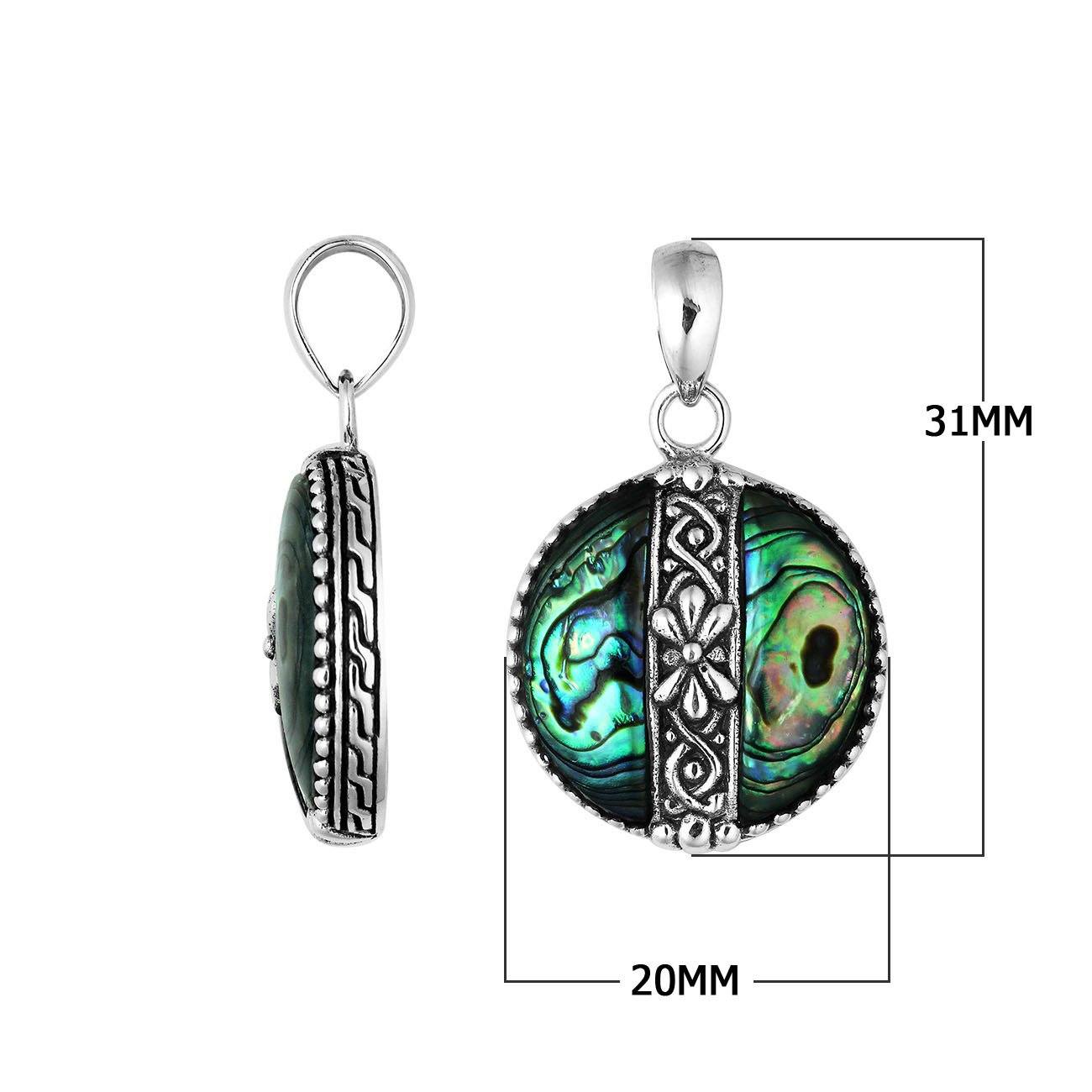 Handcrafted 925 Sterling Silver Abalone Shell round pendant featuring floral center pattern, mirror-polished finish, and iridescent tones with detailed Balinese silver artistry for wholesale buyers.