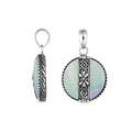 Handcrafted 925 Sterling Silver Mother Of Pearl round pendant featuring floral center pattern, mirror-polished surface, and Balinese craftsmanship for wholesale jewelry buyers and catalogs.