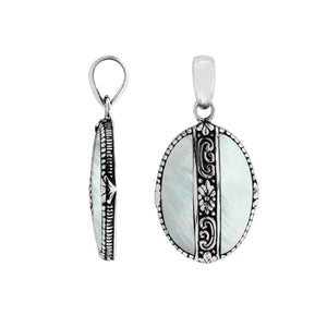 Handcrafted 925 Sterling Silver Mother Of Pearl oval pendant featuring floral center detailing, high-gloss mirror-polished finish, and classic Balinese craftsmanship for wholesale jewelry.