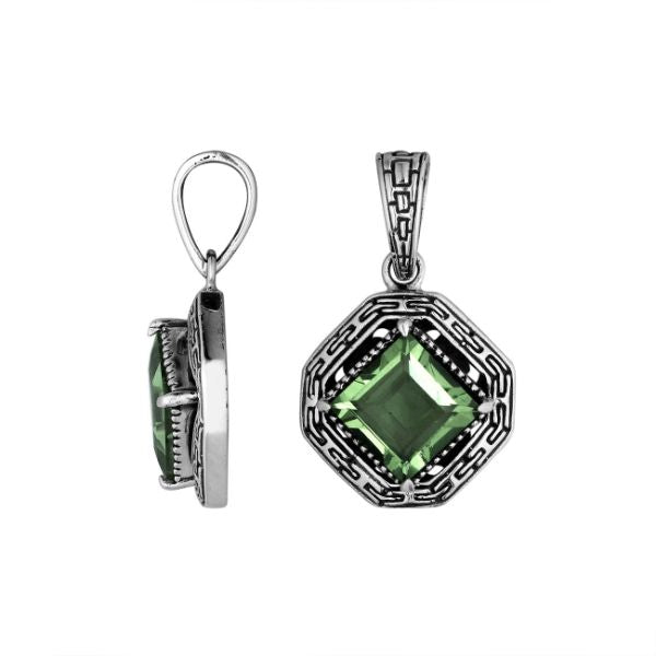 A handcrafted sterling silver pendant featuring a faceted Green Amethyst Quartz in a geometric Greek key frame, showcasing intricate Balinese silver artistry.