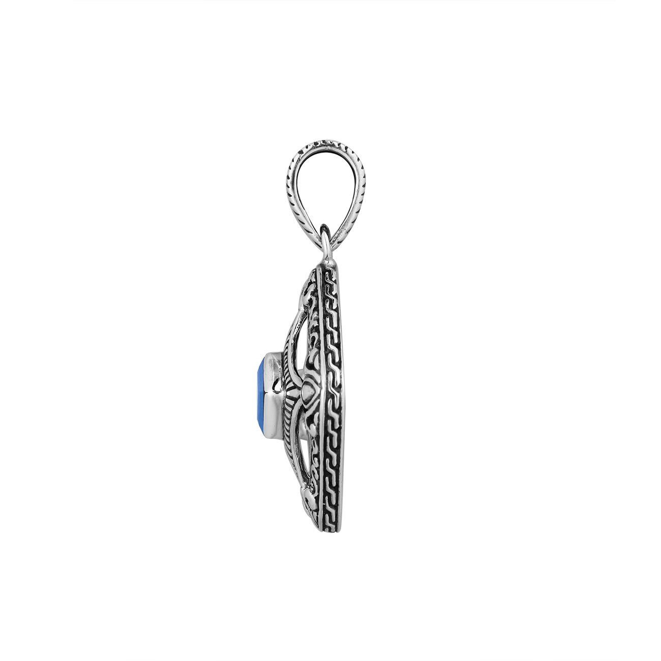 A handcrafted sterling silver pendant featuring a radiant Blue Topaz Quartz in a detailed Balinese filigree square frame with artistic silverwork.