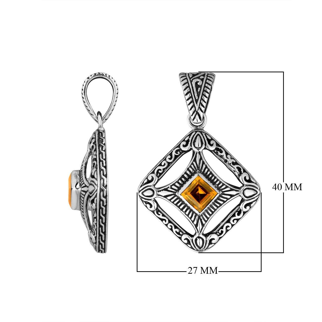 A handcrafted sterling silver pendant featuring a golden Citrine Quartz in an ornate Balinese filigree frame, showcasing fine silver artistry and elegance.