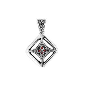 A handcrafted sterling silver pendant featuring a radiant Red Garnet Quartz in a Balinese filigree square frame with detailed silverwork.