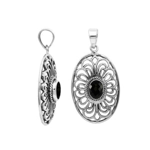 A handcrafted sterling silver pendant featuring a faceted Black Onyx in an elegant oval Balinese filigree frame.