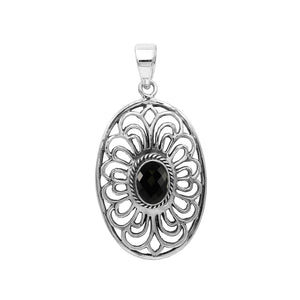 A handcrafted sterling silver pendant featuring a faceted Black Onyx in an elegant oval Balinese filigree frame.