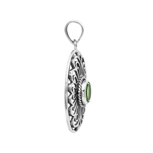 Handcrafted sterling silver pendant with Peridot Quartz in an oval Balinese filigree frame and polished silver finish.