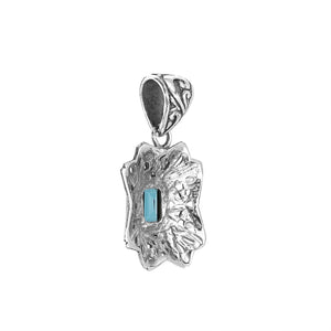Sterling silver rectangular pendant with Blue Topaz Quartz and handcrafted Balinese filigree design.