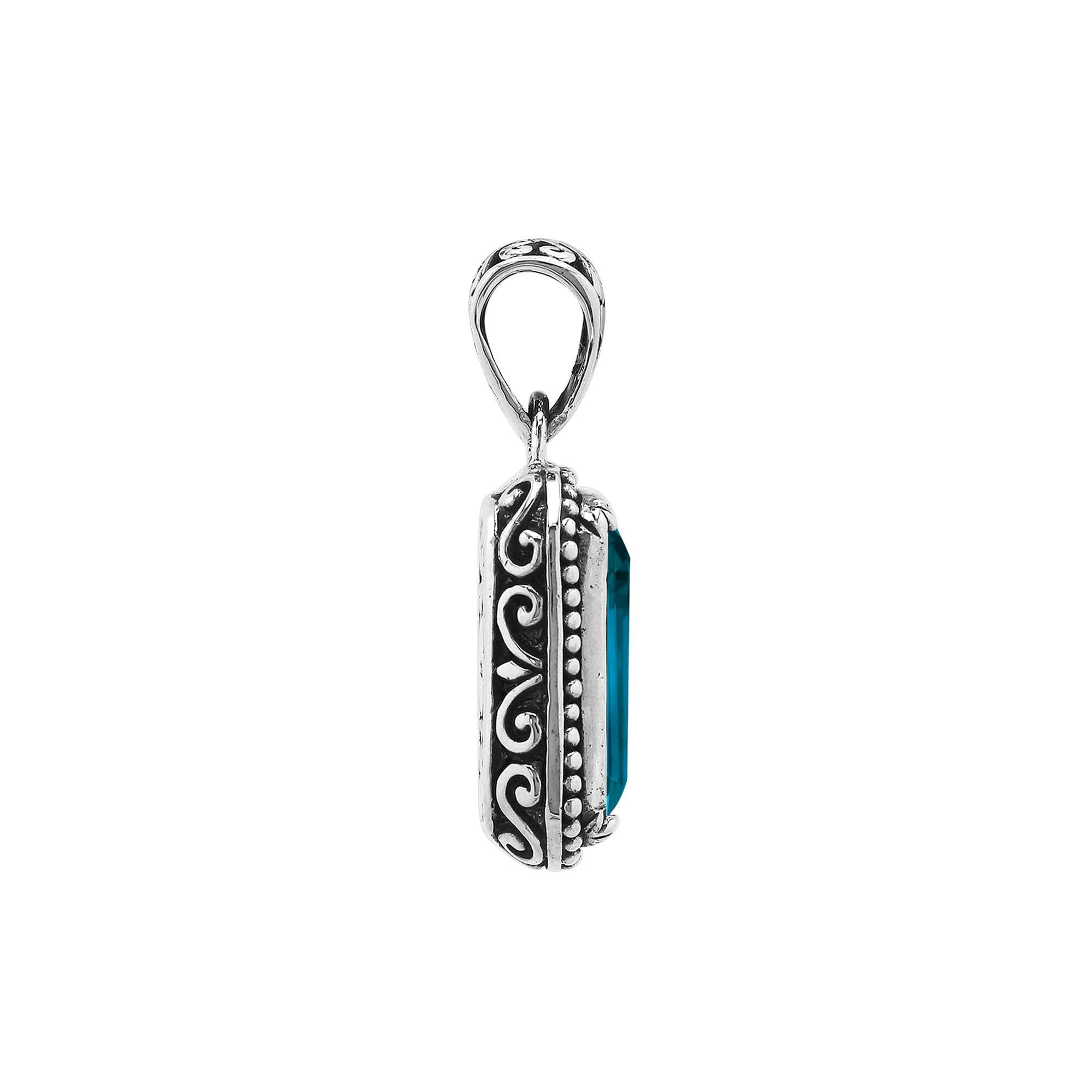 Sterling silver rectangular pendant featuring London Blue Topaz Quartz centerpiece with intricate beaded Balinese frame design.