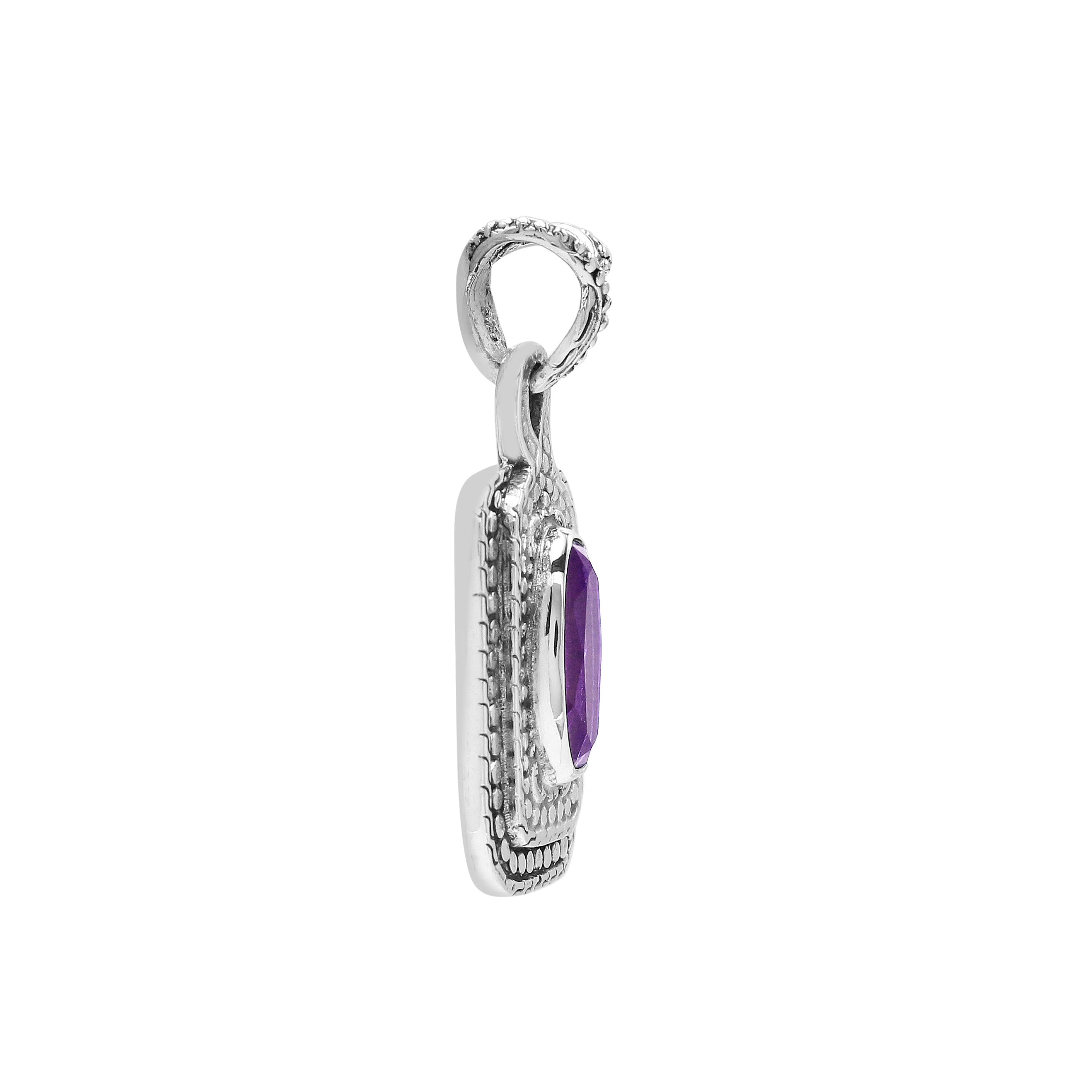Sterling silver oval pendant featuring Amethyst Quartz with traditional beaded detailing and oxidized silver craftsmanship.