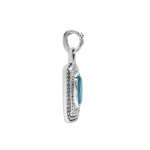 Sterling silver oval pendant featuring Blue Topaz Quartz with traditional beaded frame and oxidized silver detailing.