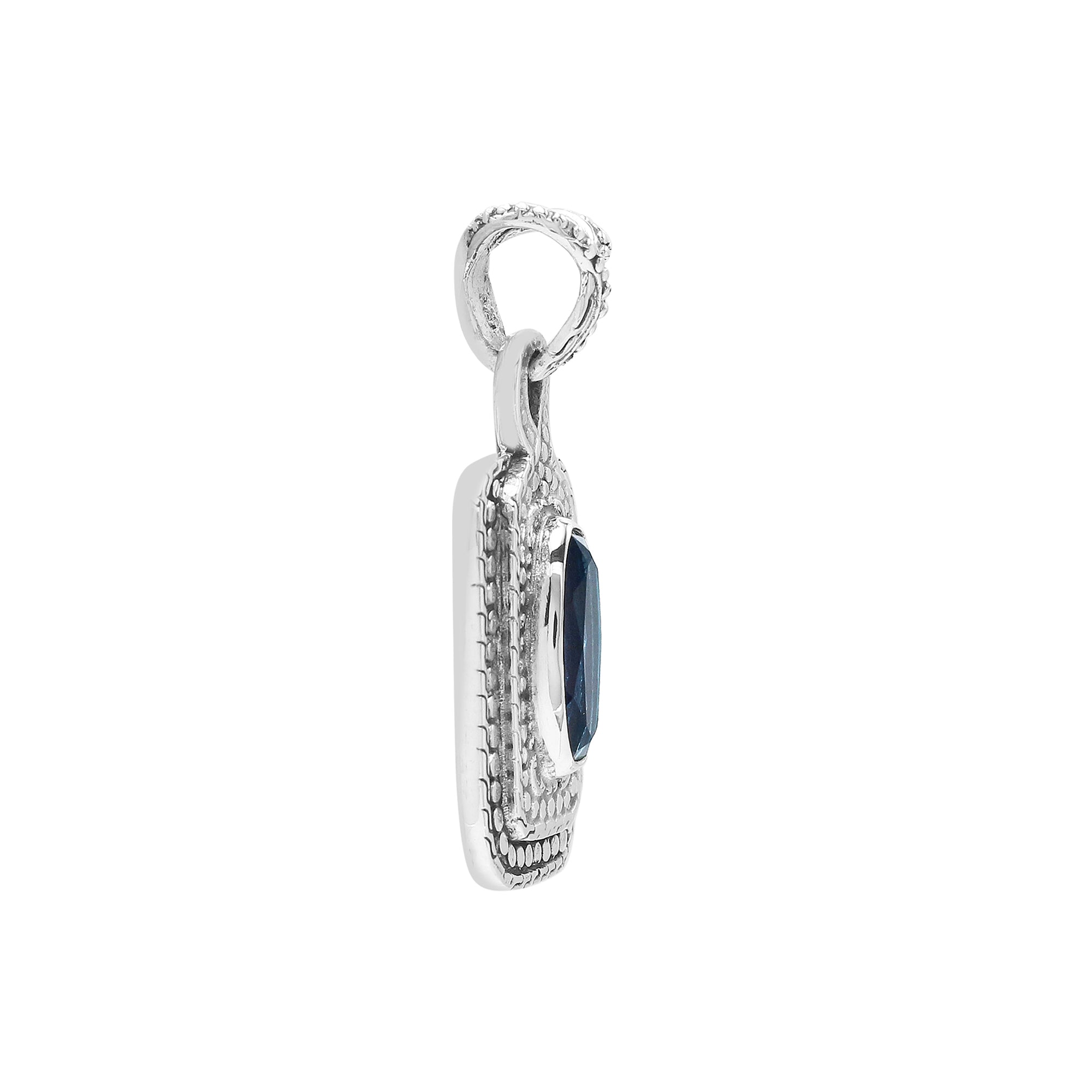 Sterling silver oval pendant featuring London Blue Topaz Quartz with traditional beaded frame and oxidized silver detailing.