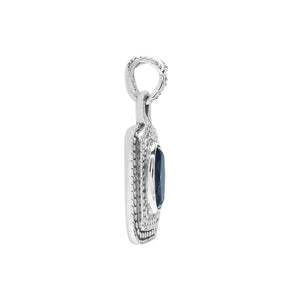 Sterling silver oval pendant featuring London Blue Topaz Quartz with traditional beaded frame and oxidized silver detailing.