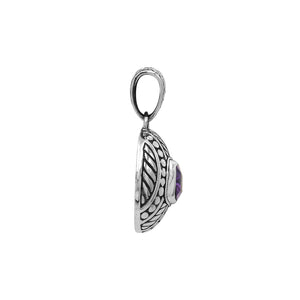 Sterling silver cushion pendant featuring Amethyst Quartz with detailed dome carving and oxidized Balinese silverwork.