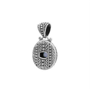 Sterling silver cushion pendant with Blue Topaz Quartz and handcrafted tribal Balinese oxidized detailing.