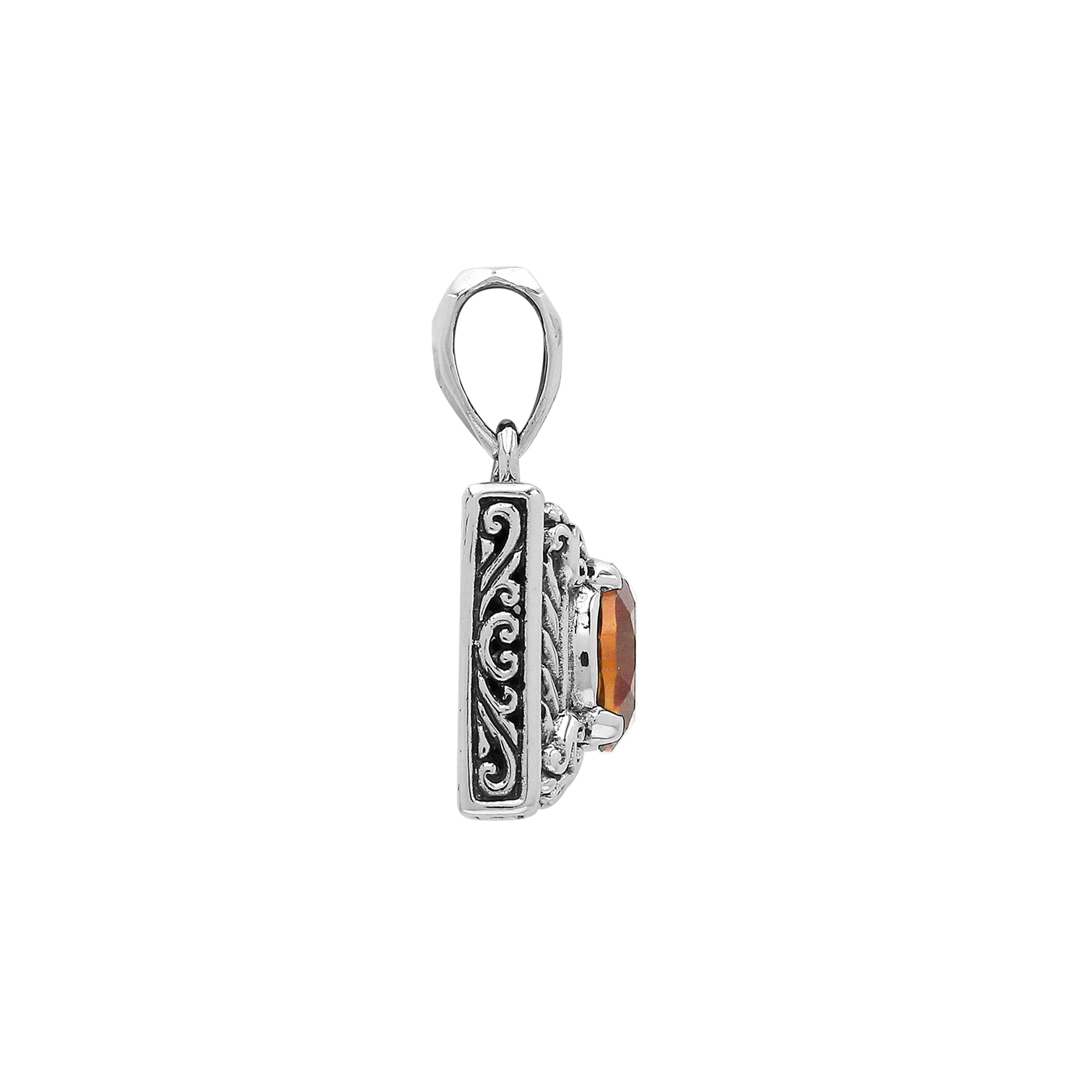 Rectangular sterling silver pendant featuring oval citrine quartz, Balinese swirl engravings, and a smooth mirror-polished finish with elegant detailing.