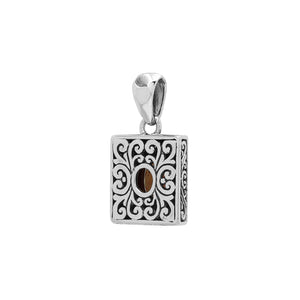 Rectangular sterling silver pendant featuring oval citrine quartz, Balinese swirl engravings, and a smooth mirror-polished finish with elegant detailing.