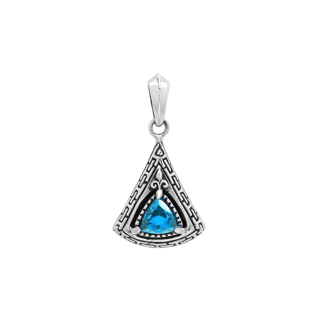 Triangular sterling silver pendant featuring trillion-cut blue topaz quartz with geometric engraving and polished Balinese finish.