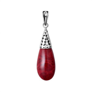 Sterling silver teardrop pendant featuring red coral with polished dot motif cap and Balinese handcrafted detailing.
