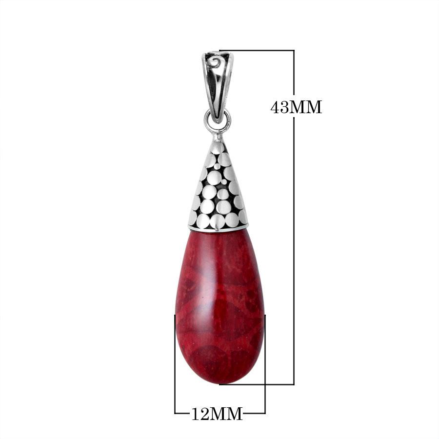 Sterling silver teardrop pendant featuring red coral with polished dot motif cap and Balinese handcrafted detailing.